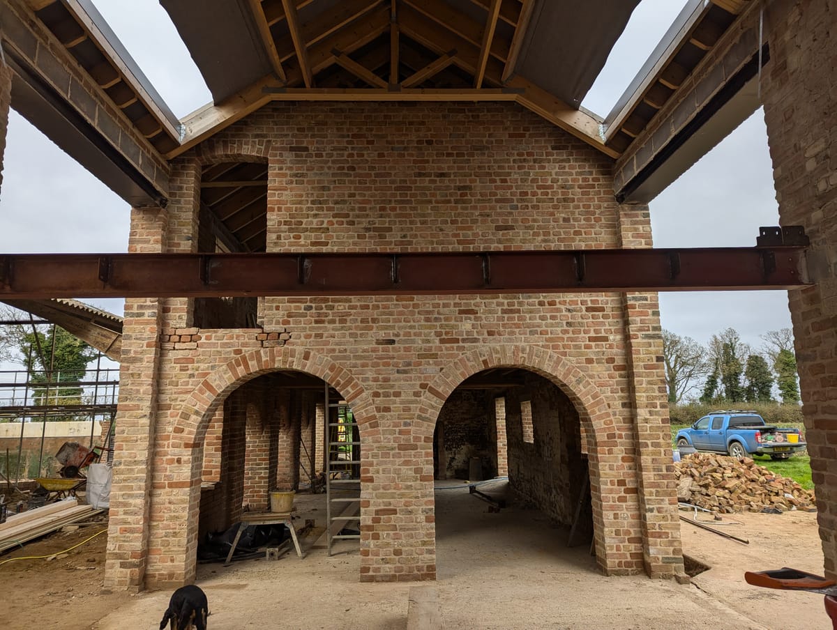 Double Arch in reclaimed Bricks